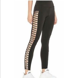 Alo full length black leggings, crossed sides